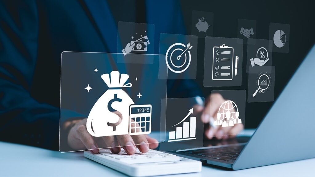 Futuristic fintech dashboard with a money bag, calculator, target, and charts overlaying a laptop screen and keyboard.